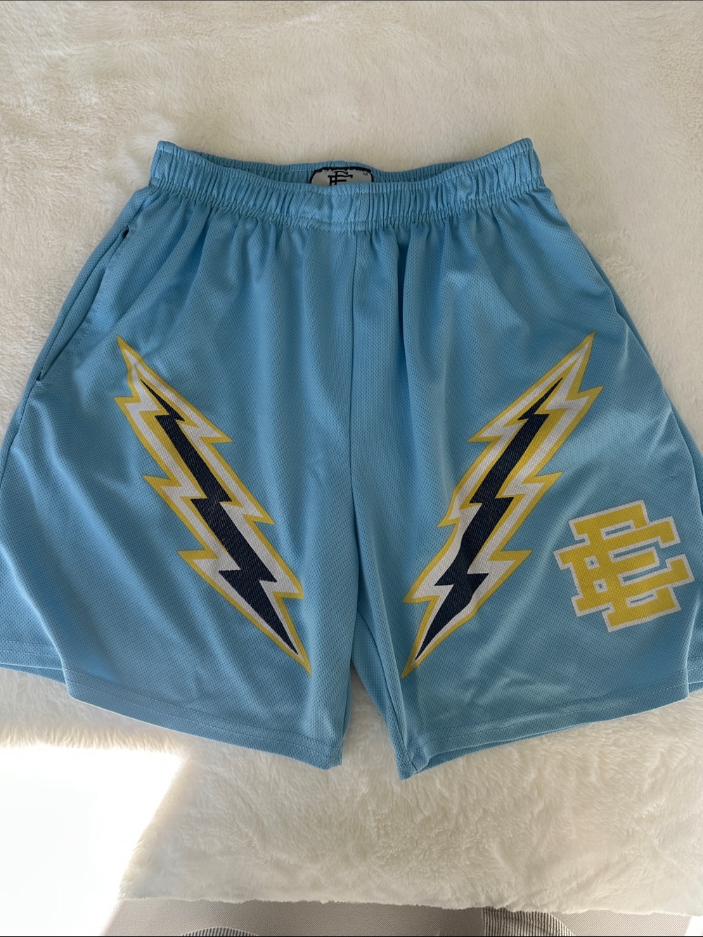 Eric Emanuel Light Blue Athletic Shorts with Yellow & Navy Lightning